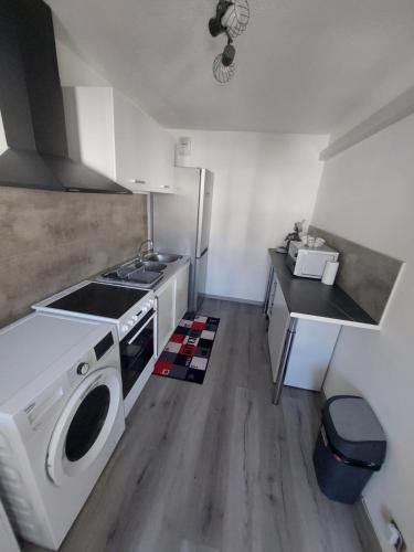 Appartement duplex climatisé 70m2 avec box privé en plein centre ville
