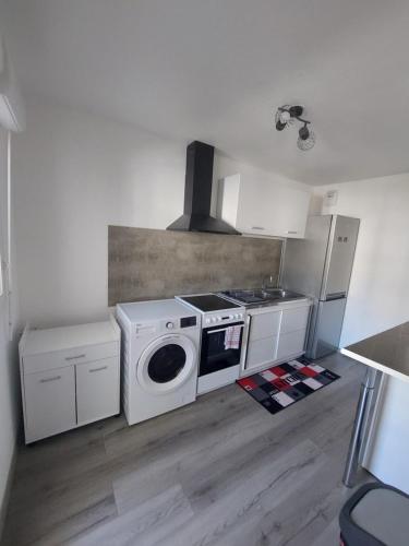 Appartement duplex climatisé 70m2 avec box privé en plein centre ville
