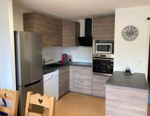 Appartement Duplex Les Orres 1800 pour 8 personnes aux pieds des pistes avec ménage et une place de parking inclus