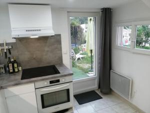 Appartement en rez de jardin avec parking gratuit