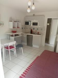 Appartement en rez de jardin et parking privatifs près des pistes