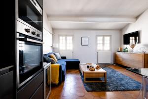 Appartement Exceptionnel sur la place du Palais des papes Wifi