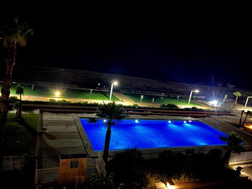 Appartement face mer et piscine wifi clim garage