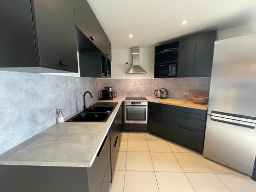 Appartement Grand Confort de 115m2 pour 8pers avec Sauna, Parking et Jardin