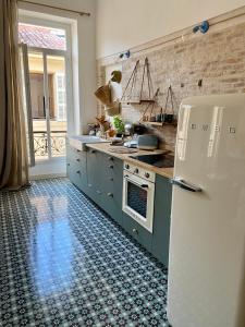 Appartement Haussmannien rue piétonne Opéra