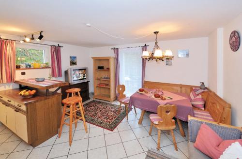 Appartement im Souterrain mit Terrasse