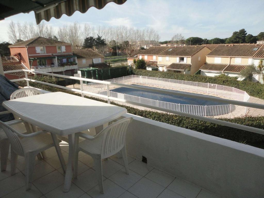 Appartement Le Grau-du-Roi, 2 pièces, 4 personnes - FR-1-250-216 AVENUE JEAN JAURES DROITE ENTREE RESIDENCE - N°120 - 1ER ETAGE, 30240 Le Grau-du-Roi