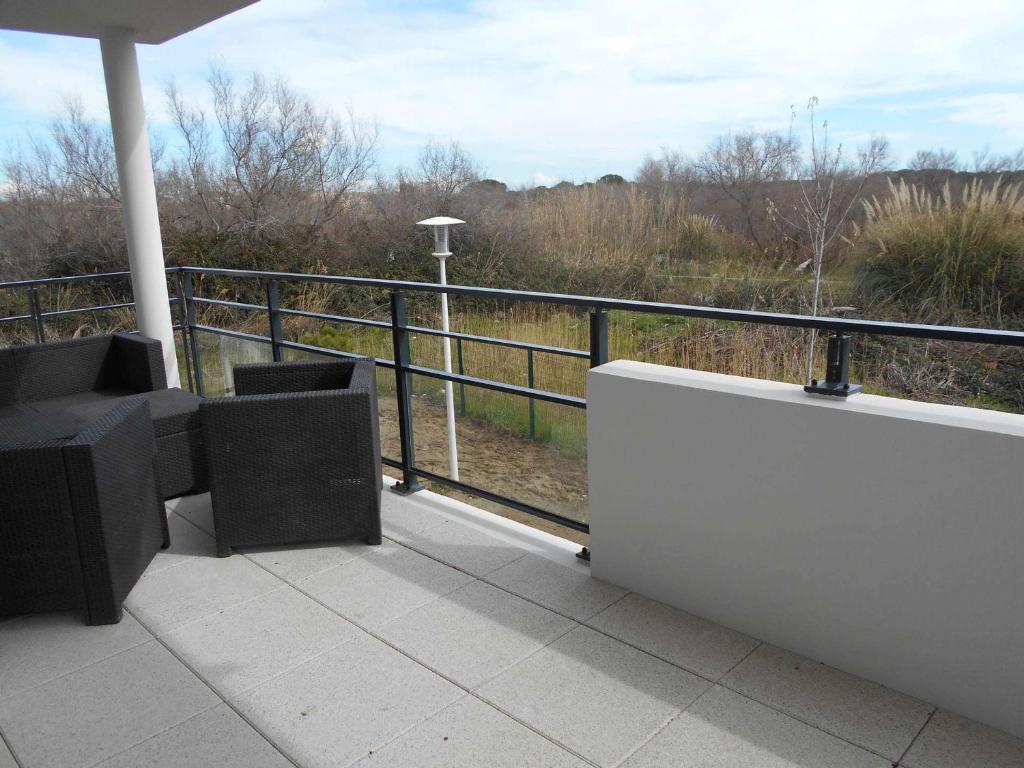 Appartement Le Grau-du-Roi, 2 pièces, 6 personnes - FR-1-250-198 145 ROUTE DE L'OUTARDE CANEPETIERE BAT B - ETAGE 1- PORTE 103, 30240 Le Grau-du-Roi