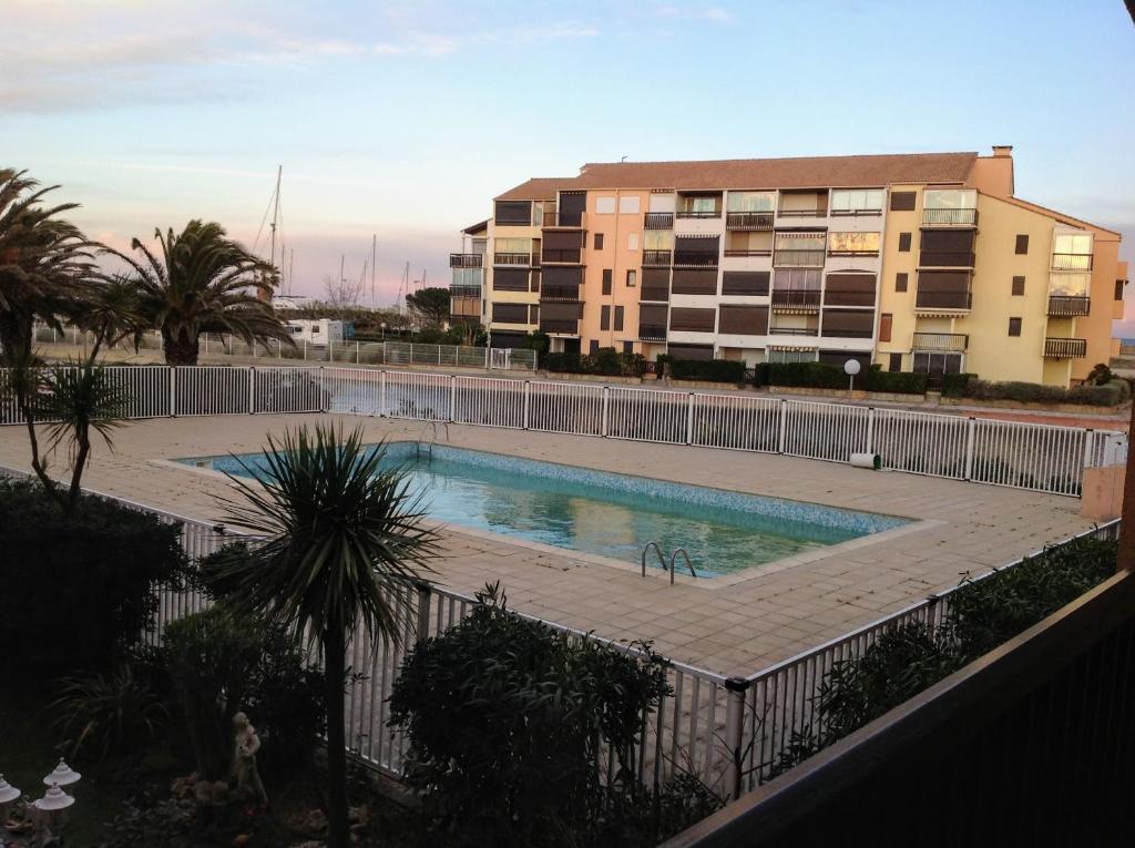 Appartement-Marina climatisé 4 couchages avec Piscine Résidence Marina 2, Appartement 407, quartier des capellans, impasse varèse Saint cyprien plage, 66750 Saint-Cyprien Plage