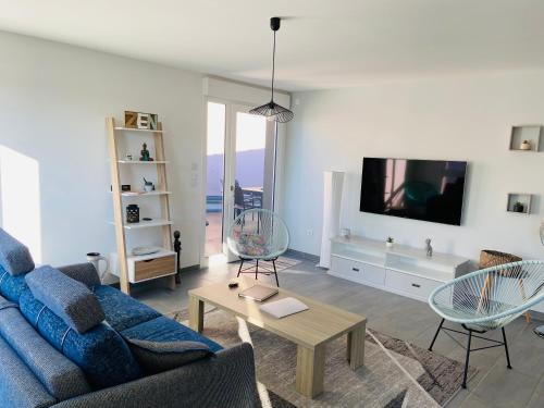 Appartement Orchidées proche centre Ville