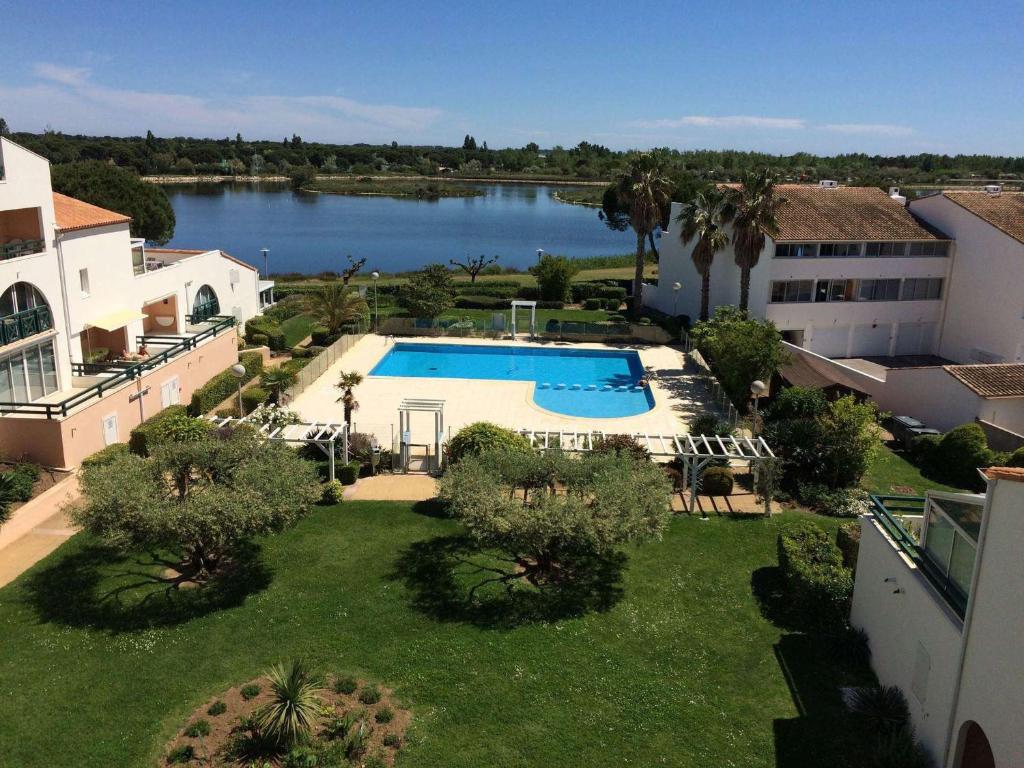 Appartement Port Camargue, 3 pièces, 6 personnes - FR-1-250-192 340 AVENUE DE LA LAUNE ENTREE B - ETAGE 3 - PORTE 87 - GARAGE N°87, 30240 Le Grau-du-Roi