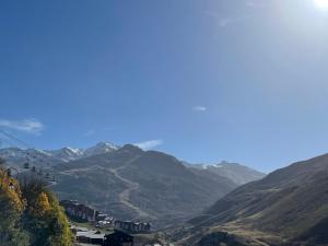Appartement pour 6 personnes au pied des pistes au calme aux Menuires les Asters