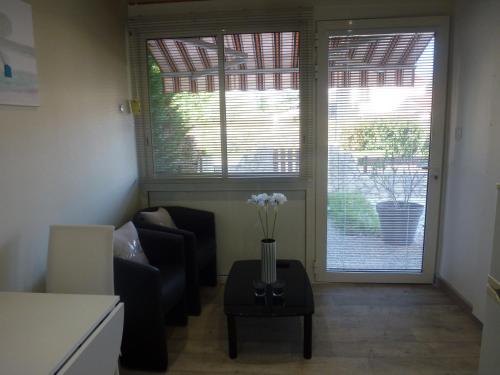 Appartement proche Centre et Arènes