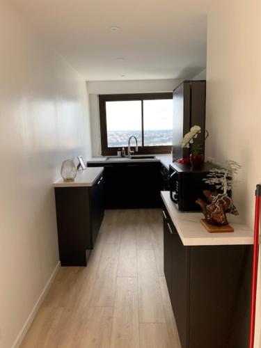 Appartement refait avec vue sur la ville