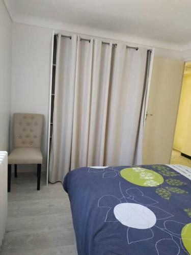 Appartement- Rez de jardin dans maison individuelle