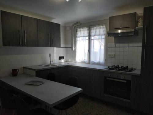 Appartement- Rez de jardin dans maison individuelle