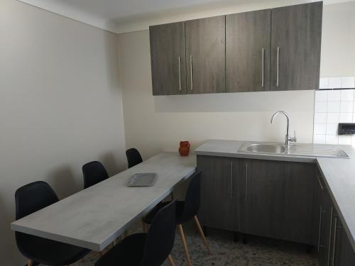 Appartement- Rez de jardin dans maison individuelle