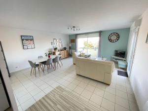 Appartement Spacieux proche digue avec jardin