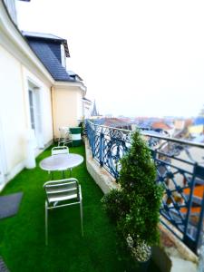Appartement-Terrasse dans un ancien Palace Vichyssois coeur de ville