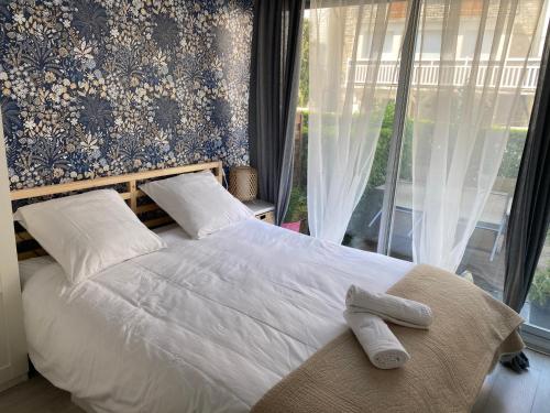 Appartement terrasse privée grande plage à 100 m - Parking gratuit