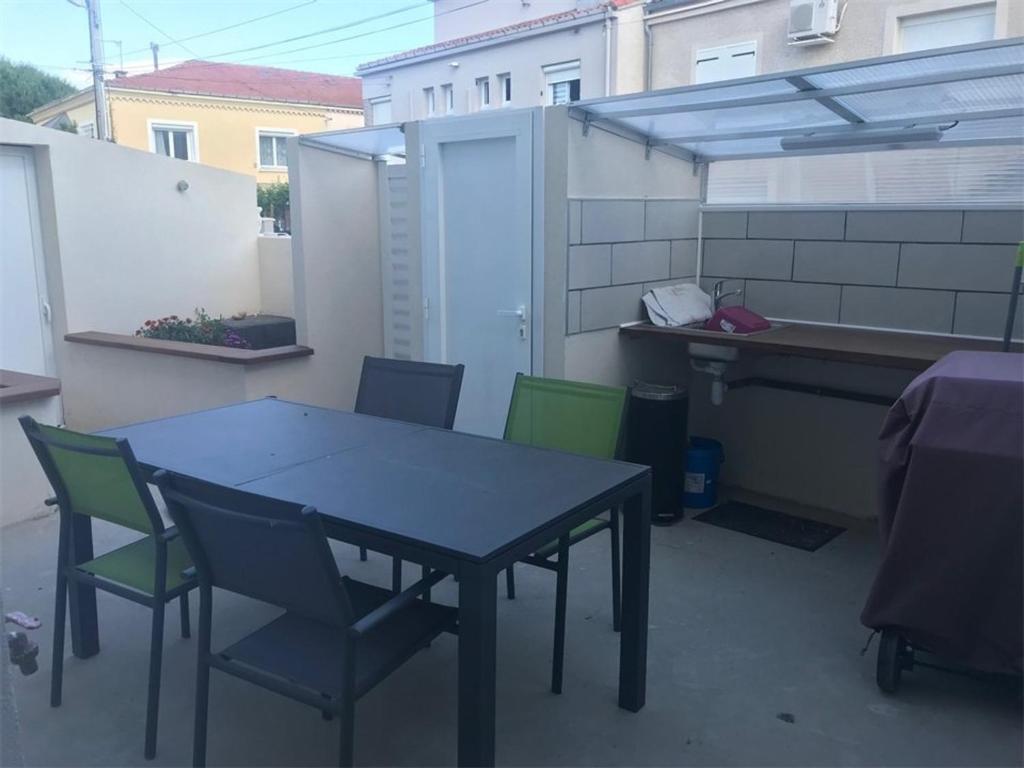 Appartement Appartement Valras-Plage, 4 pièces, 6 personnes - FR-1-701-7 6 IMPASSE BAPTISTIN SOULIÉ AU REZ DE CHAUSSÉE 34350 Valras-Plage