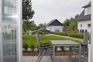 Appartementhaus Inselwind FeWo 02 MEERsand