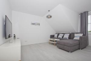 Appartementhaus Inselwind FeWo 13 MEERstrand Meerblick, Gartennutzung
