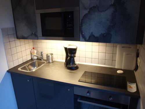 Appartment Grau im Grünen