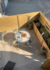 Apt RDC avec sa terrasse privée