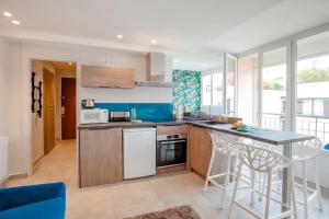 Atmosphere Cosy Grange-Blanche : balcon et calme