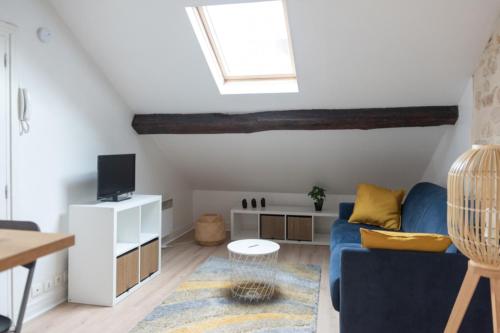 Attic apartment with exposed beams