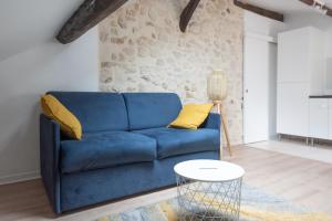 Attic apartment with exposed beams