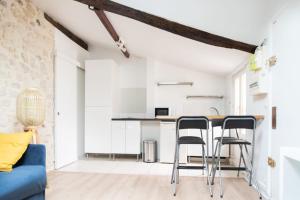 Attic apartment with exposed beams
