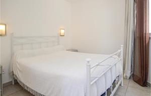 Awesome apartment in Moriani Plage with 1 Bedrooms, WiFi and Outdoor swimming pool