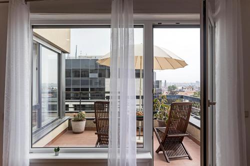 Balcony Over Porto by LovelyStay