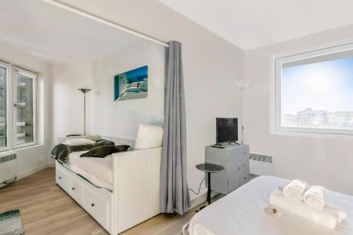Beau studio avec vue mer dans le port de Deauville - Welkeys