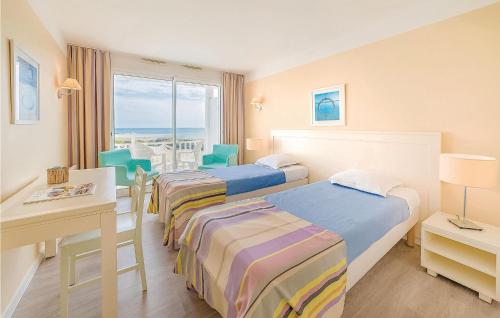 Beautiful apartment in Chteau-dOlonne with 2 Bedrooms, WiFi and Heated swimming pool