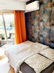 Bel appartement à 50m de la plage, 2 pièces climatisées, parking privé