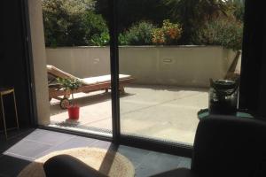 Bel espace de vie en rez-de-jardin