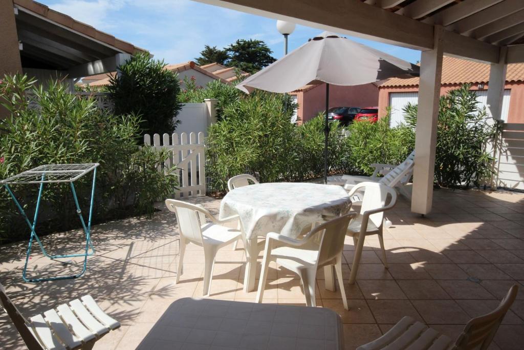 Appartement Belle villa 2 chambres terrasse en angle parking privatif dans résidence sécurisée piscine commune 800 m de la mer LRCS151 151 AVENUE DU GRAND SALAN 34420 Portiragnes