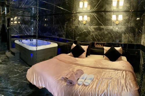 BlackSuite, suite luxueuse avec jacuzzi privatif