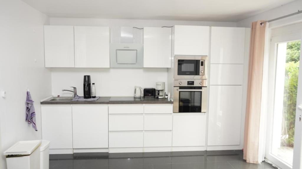 Blumenberg Ferienwohnung 77 Beim Brinkmannschen Park, 21079 Hambourg