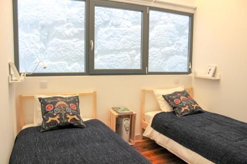 Bonjardim Flats - T1 + 1 com terraço
