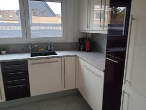 BREUERS PulHEIM Appartment blau
