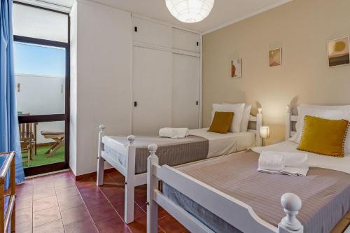 Bright 1BDR Apartment W/Balcony & Pool by LovelyStay
