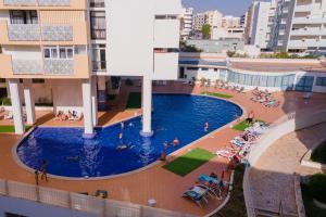 Appartement Bright 1BDR Apartment W/Balcony & Pool by LovelyStay Prolongamento Av. General Humberto Delgado - Torre Iberius, Lote 5 8ºD 8365-138 Silves Algarve