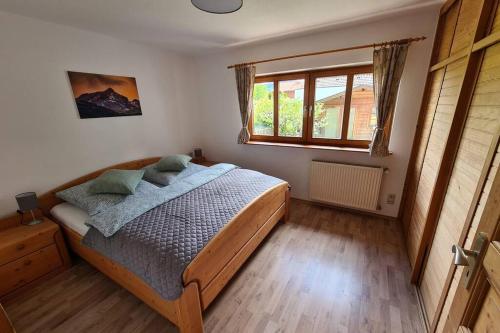By Toni - Ferienwohnung mit Garten in Garmisch