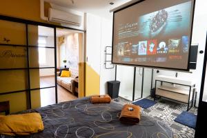 Capsule Premium balnéo & home cinema