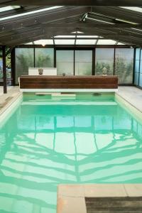 Appartement Capsule SPA - piscine privative, sauna, jacuzzi 55 Rue du Quesnoy 59920 Quiévrechain Nord