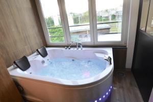 Capsule Wellness - sauna - balneo - machine de sport privatif - PS5 - 2 chambres